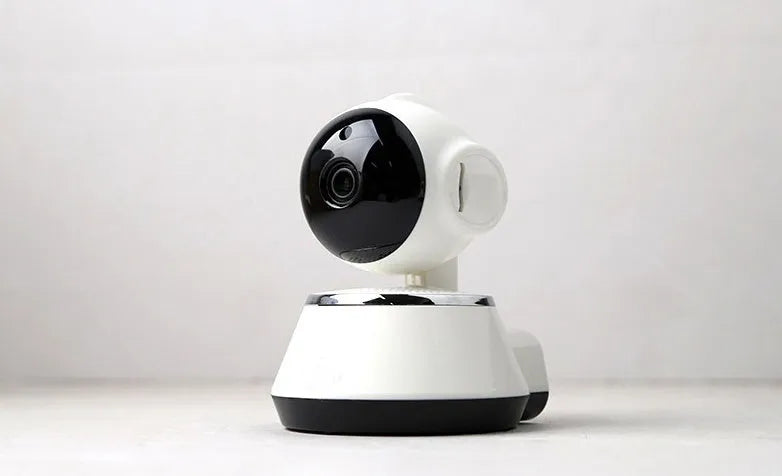 White WiFi baby monitor camera with 720P HD resolution, pan and tilt, and night vision for home use