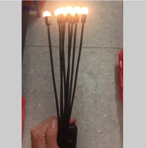 Solar-powered LED garden light with ground spike for soil installation in warm white or coloured lighting options