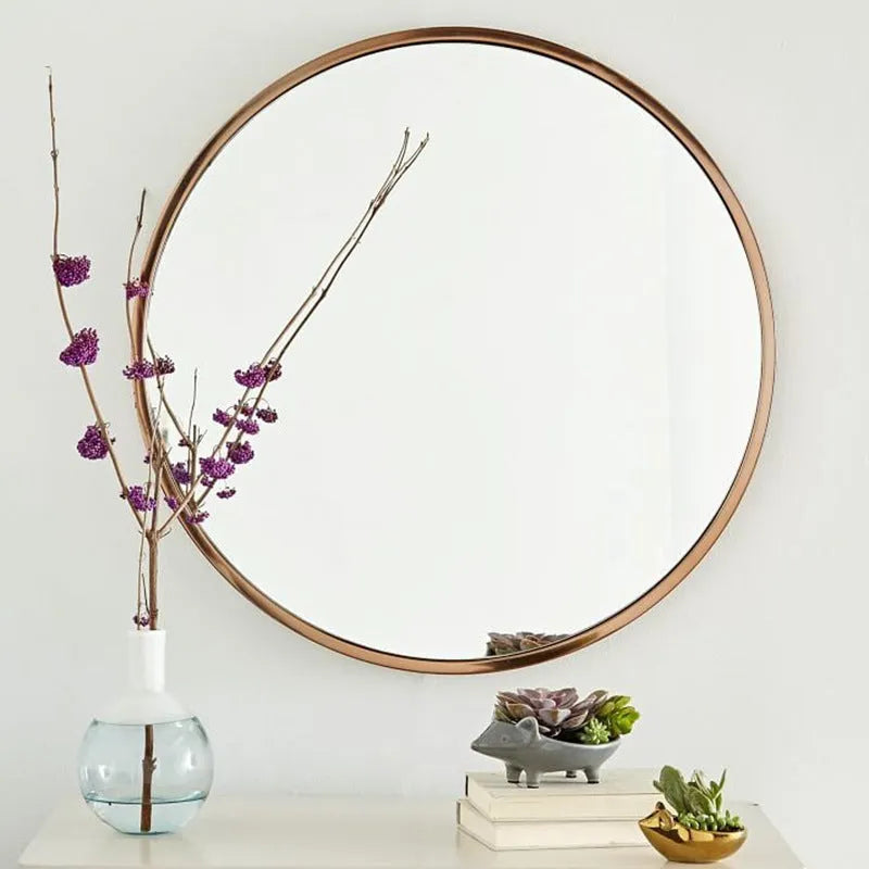 Round metal frame bathroom wall mirror in black finish showing 30cm diameter