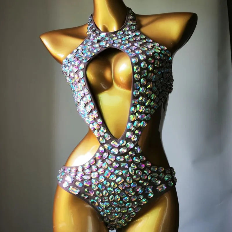 Women's black mesh diamond one-piece swimsuit on a mannequin, showing the front design.