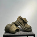 Retro distressed worker boots in cow suede with thick soles and low tube sock length