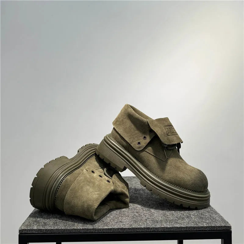 Retro distressed worker boots in cow suede with thick soles and low tube sock length