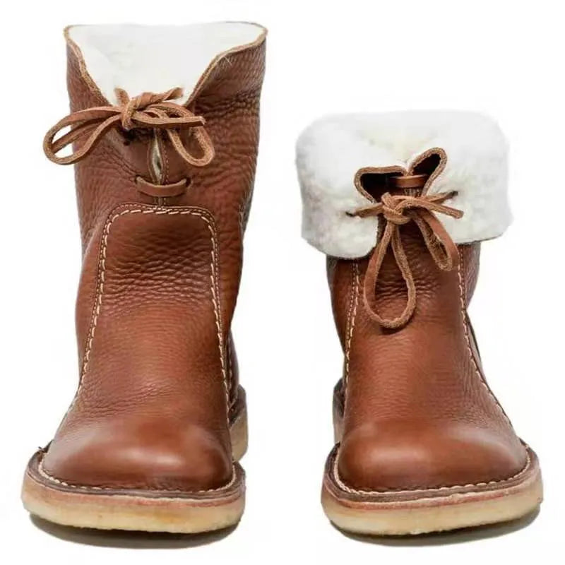 Women's winter snow boots with lace-up design, cotton lining, and non-slip rubber sole in a choice of colours