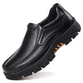 Men's black and brown business casual slip-on shoes made from cowhide leather with rubber soles.