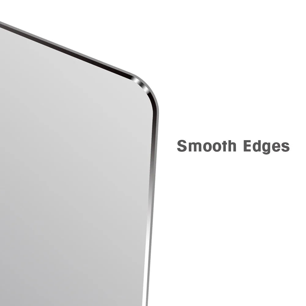 Aluminium alloy double-sided mouse pad in black finish on a desk for gaming or office use