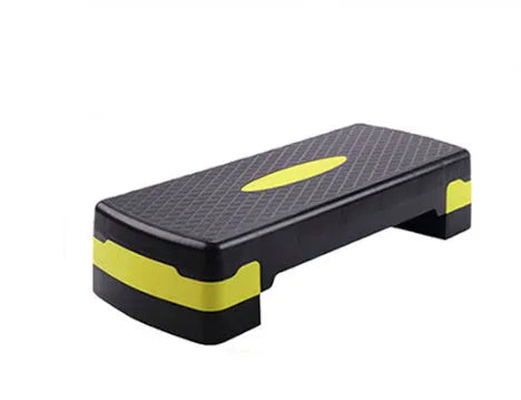 Grey Fit Step aerobic platform on a wood floor, showing its 68cm length and 15cm height.