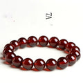 Natural orange red garnet crystal bracelet with ruyi motif in retro unisex design