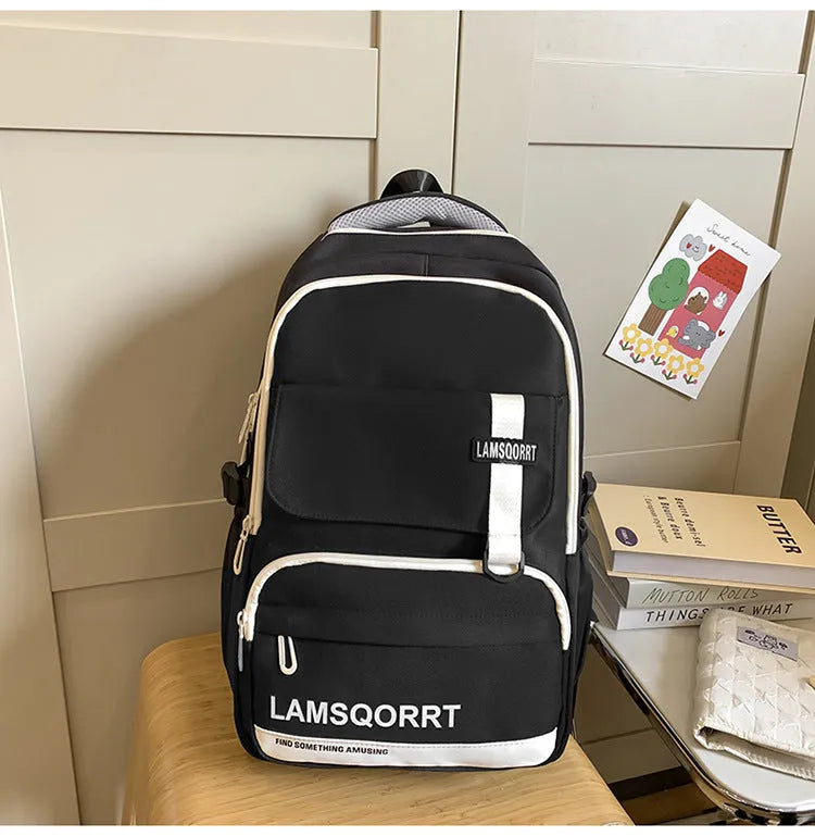 High school student backpack in waterproof nylon with curved shoulder straps and under 20L capacity