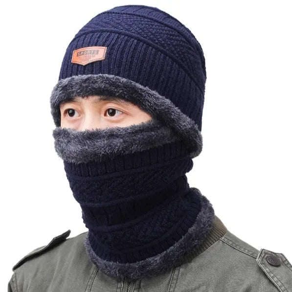 Men's black acrylic knitted hat and scarf set on a neutral background, showing plain knit texture