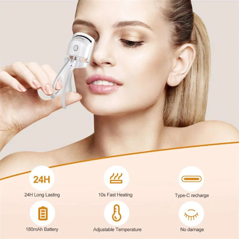 White and pink USB rechargeable heated eyelash curler with dual temperature settings.
