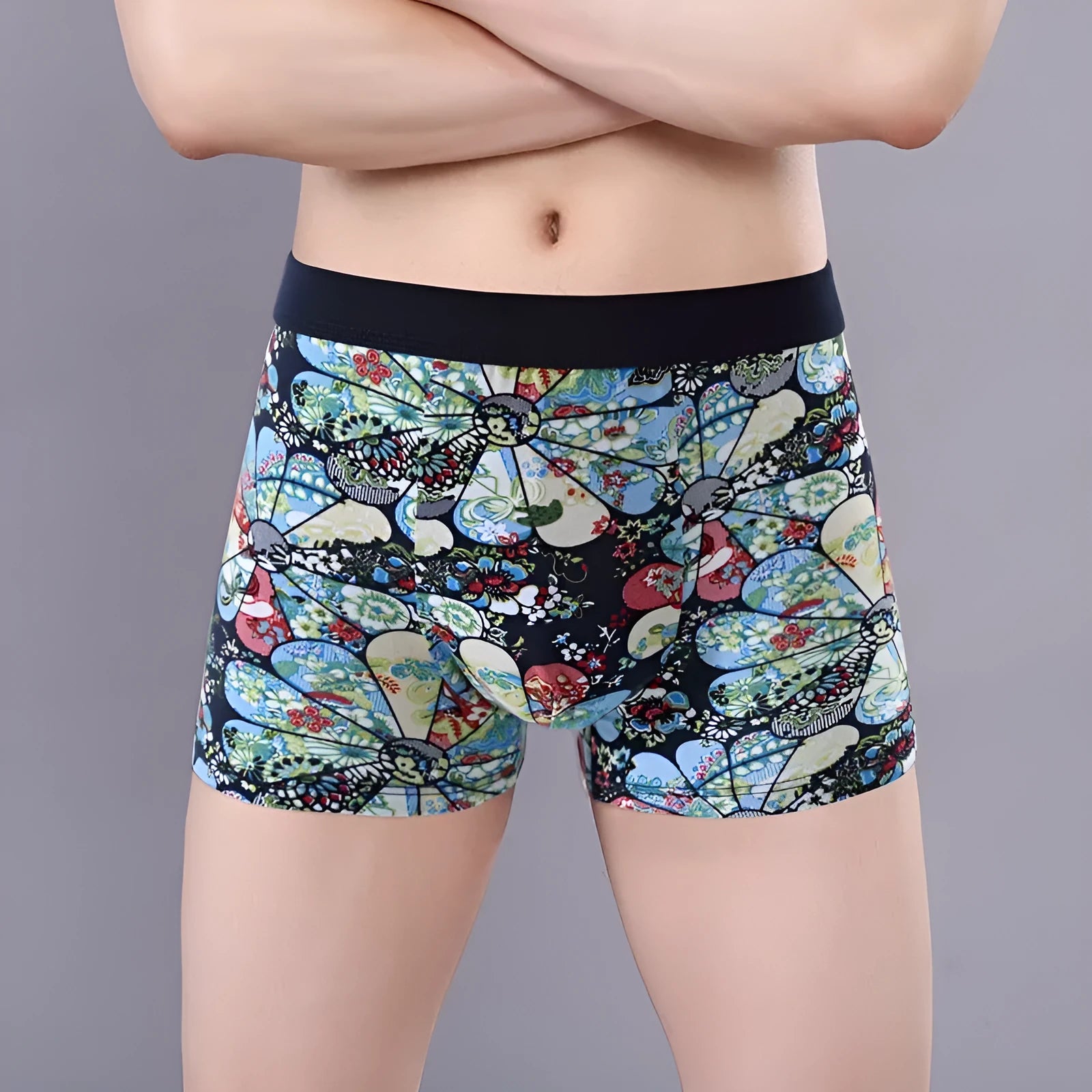 Men's floral print cotton boxer shorts showing the U-shaped pouch design and available colour variations.