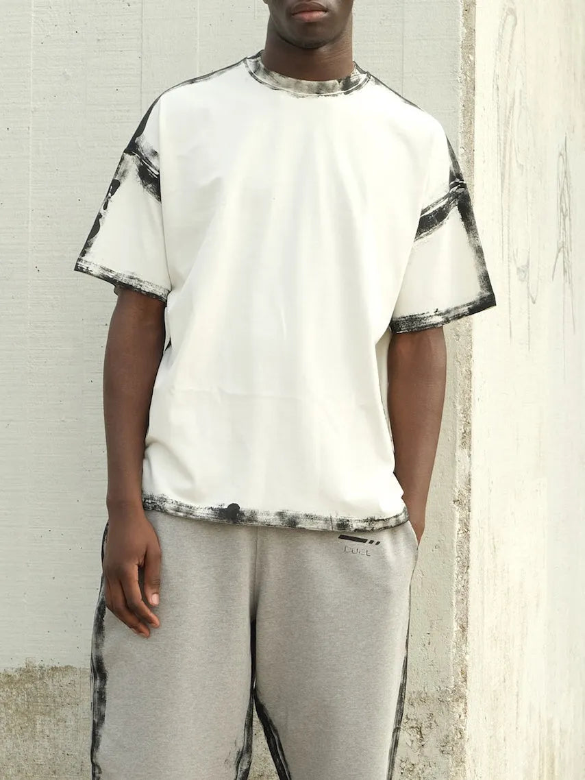 White casual short sleeve top with draped design and printed detail on polyester fabric