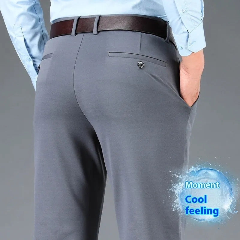 Men's plus-sized straight-leg trousers in navy blue with an elasticated waistband, shown with a zip fly and business casual styling.