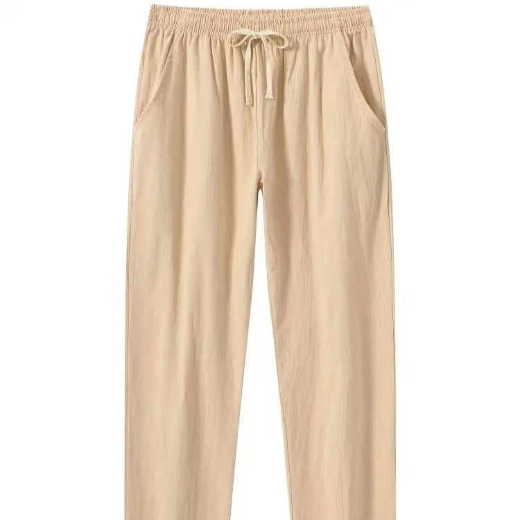 Men's loose-fit cotton beach trousers in solid white, sky blue, khaki, or black colours.