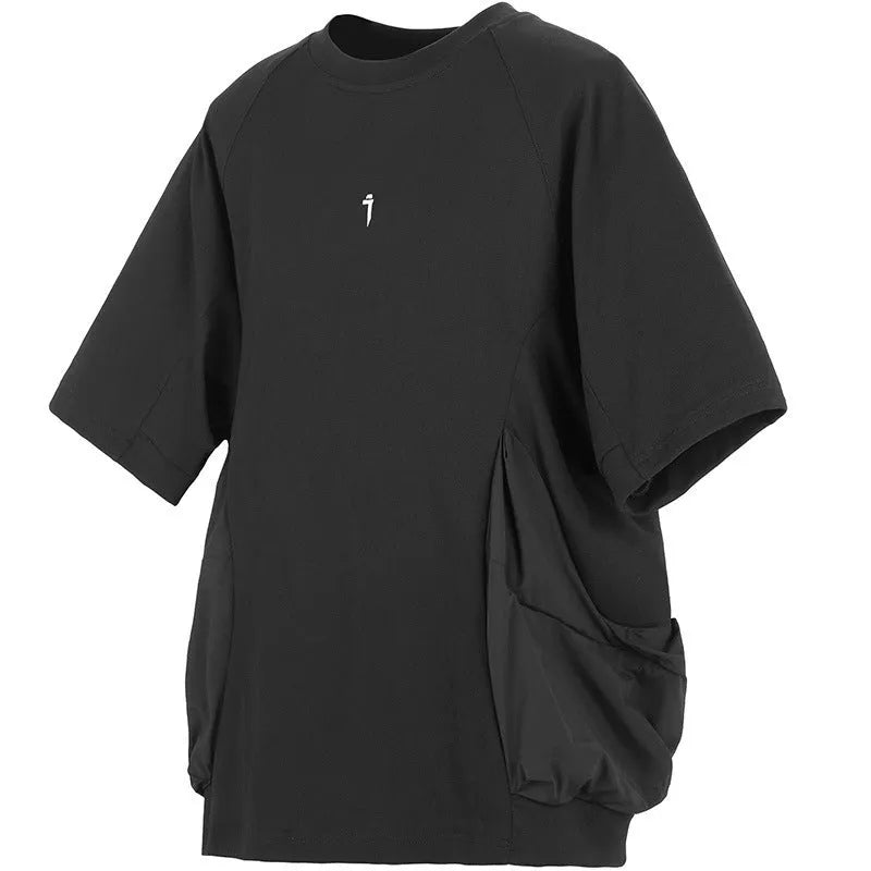 Men's loose grey cotton T-shirt with large front pockets and short sleeves.