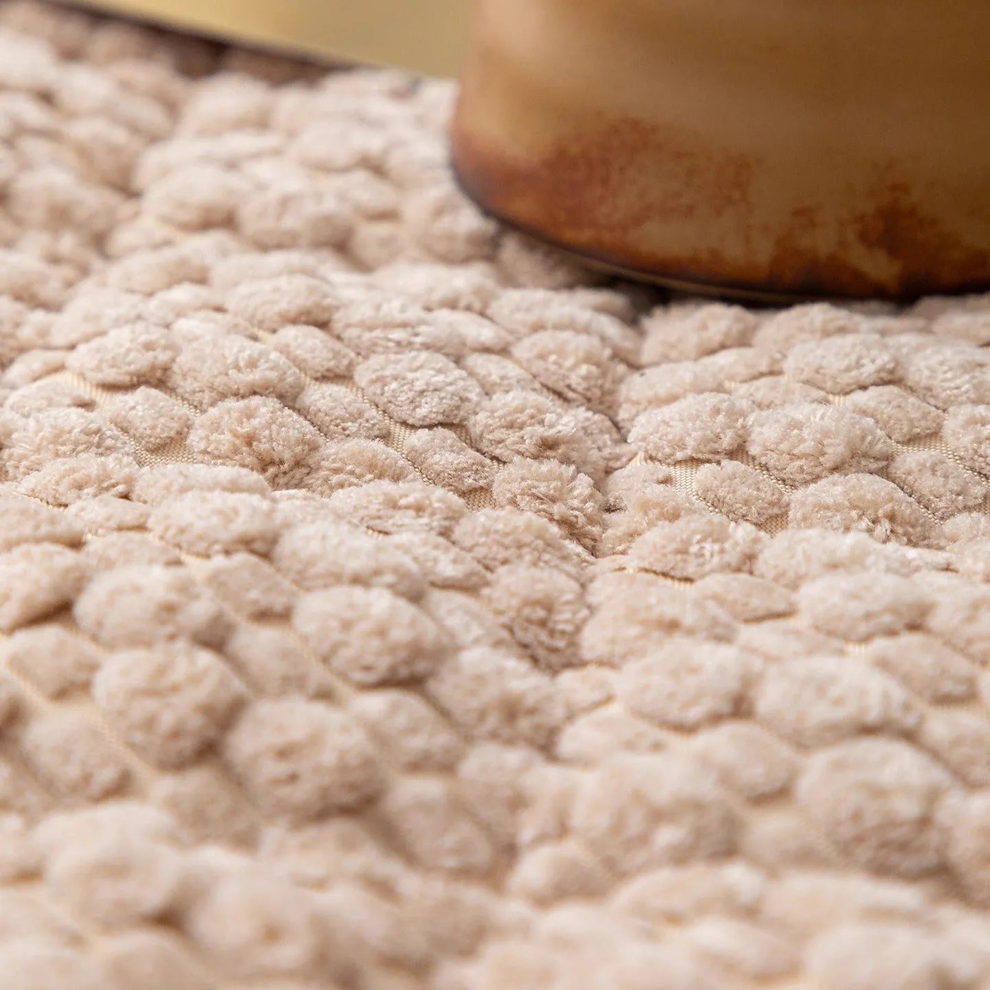 New corduroy sofa cushion in solid puff-beige colour showing textured corduroy fabric