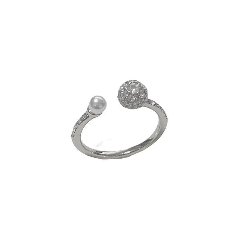 Round zircon open-end pearl ring in gold or silver colour with thick real gold plating over copper