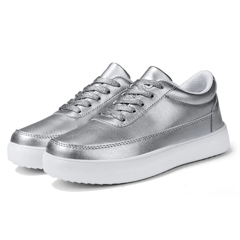 Women's leather flat casual shoes in solid colour with front lace-up closure