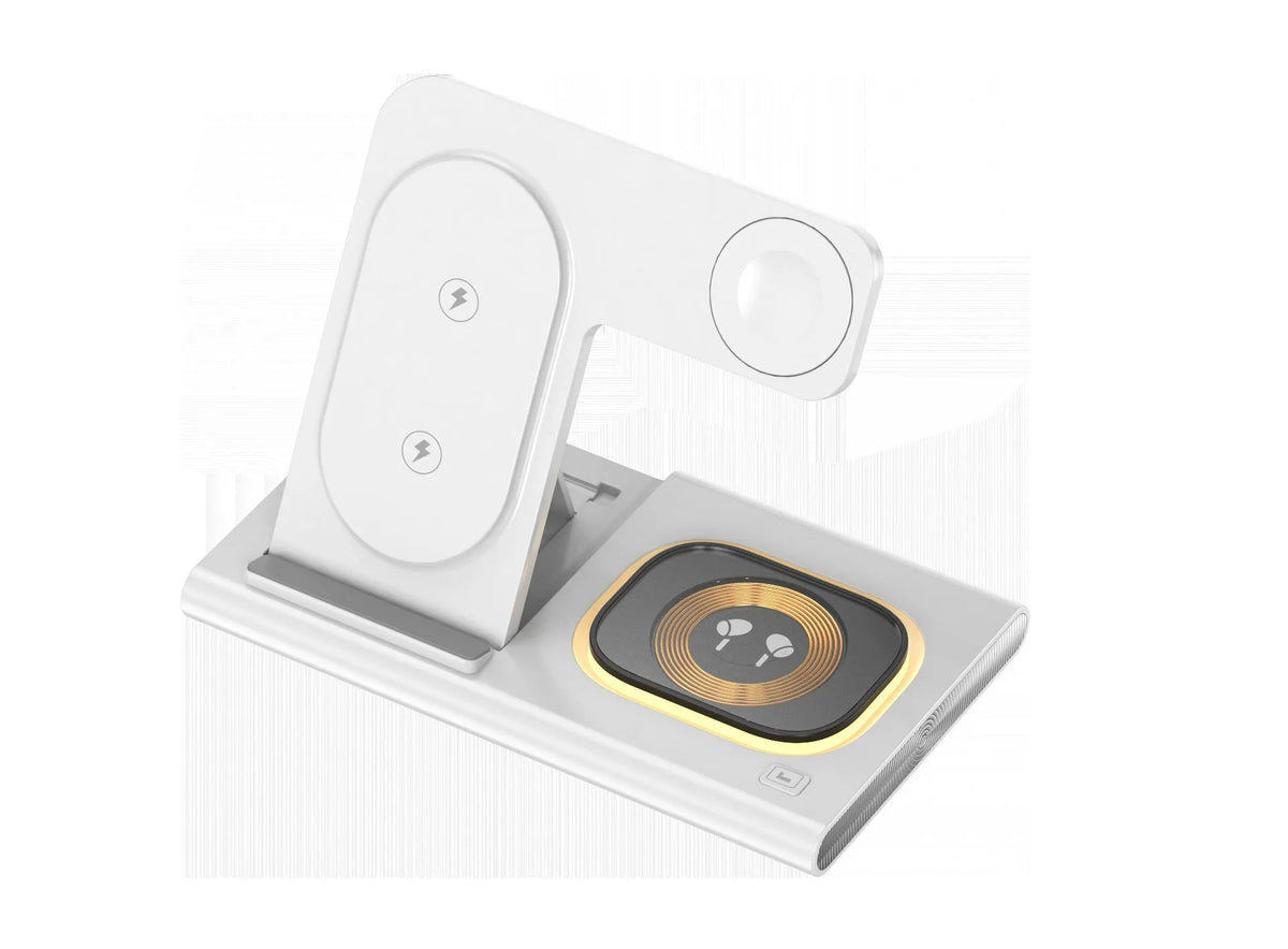 Black folding four-in-one wireless charger on a desk, showing its compact size and USB connection.