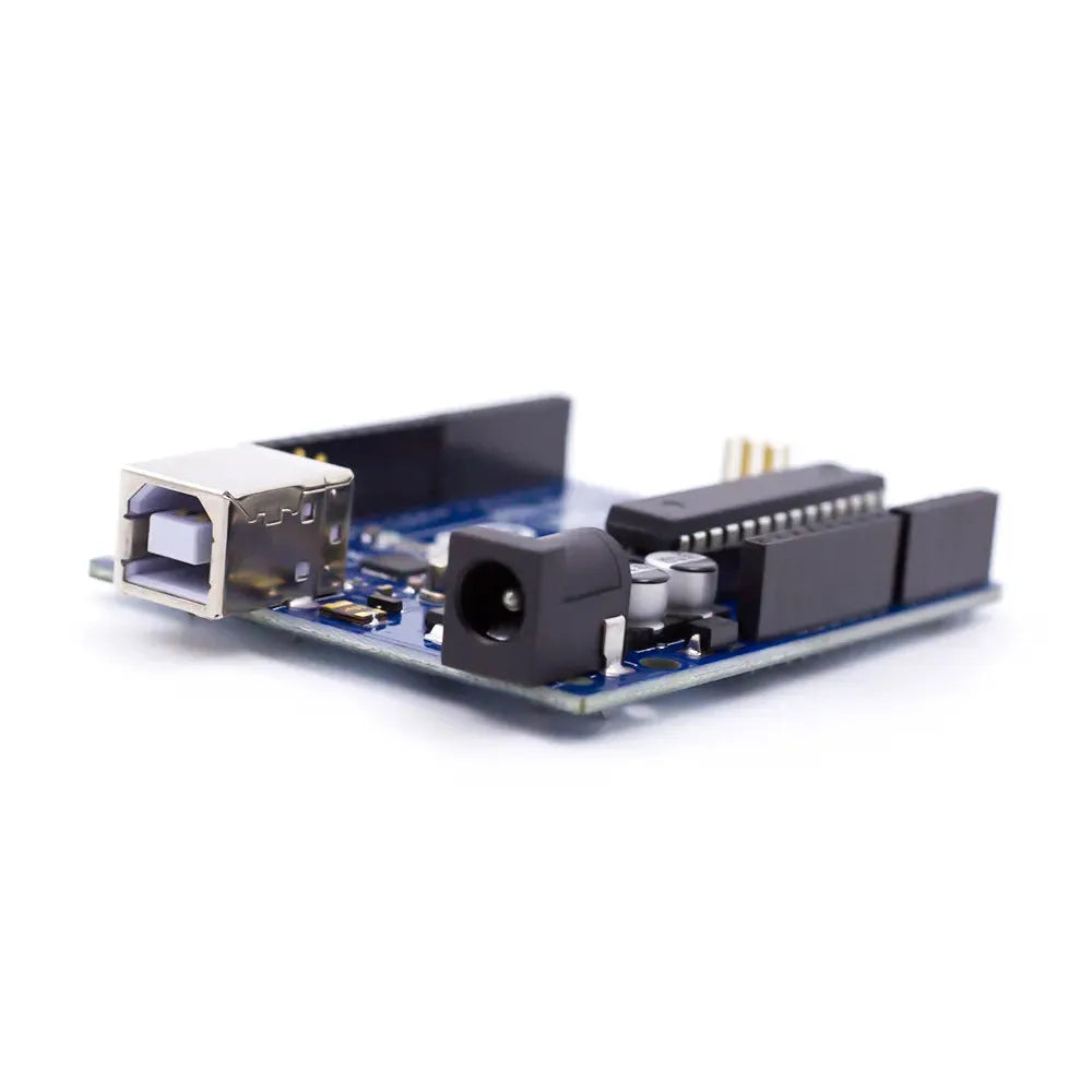 ATmega328P UNO R3 development board with USB cable for programming microcontroller projects