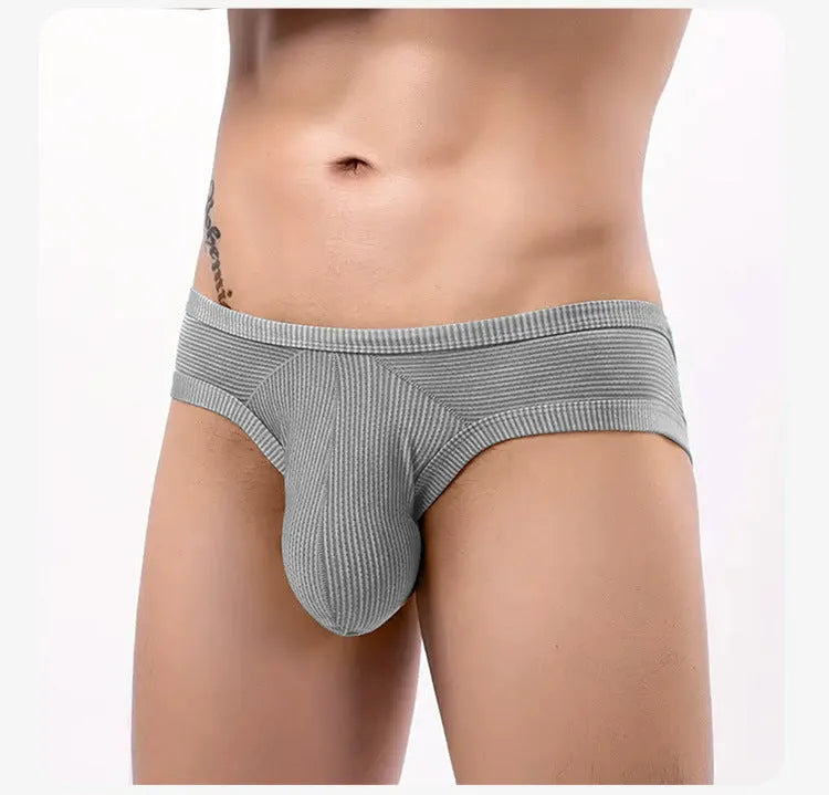 Men's cotton briefs in seven colour options showing low waist boxer style design