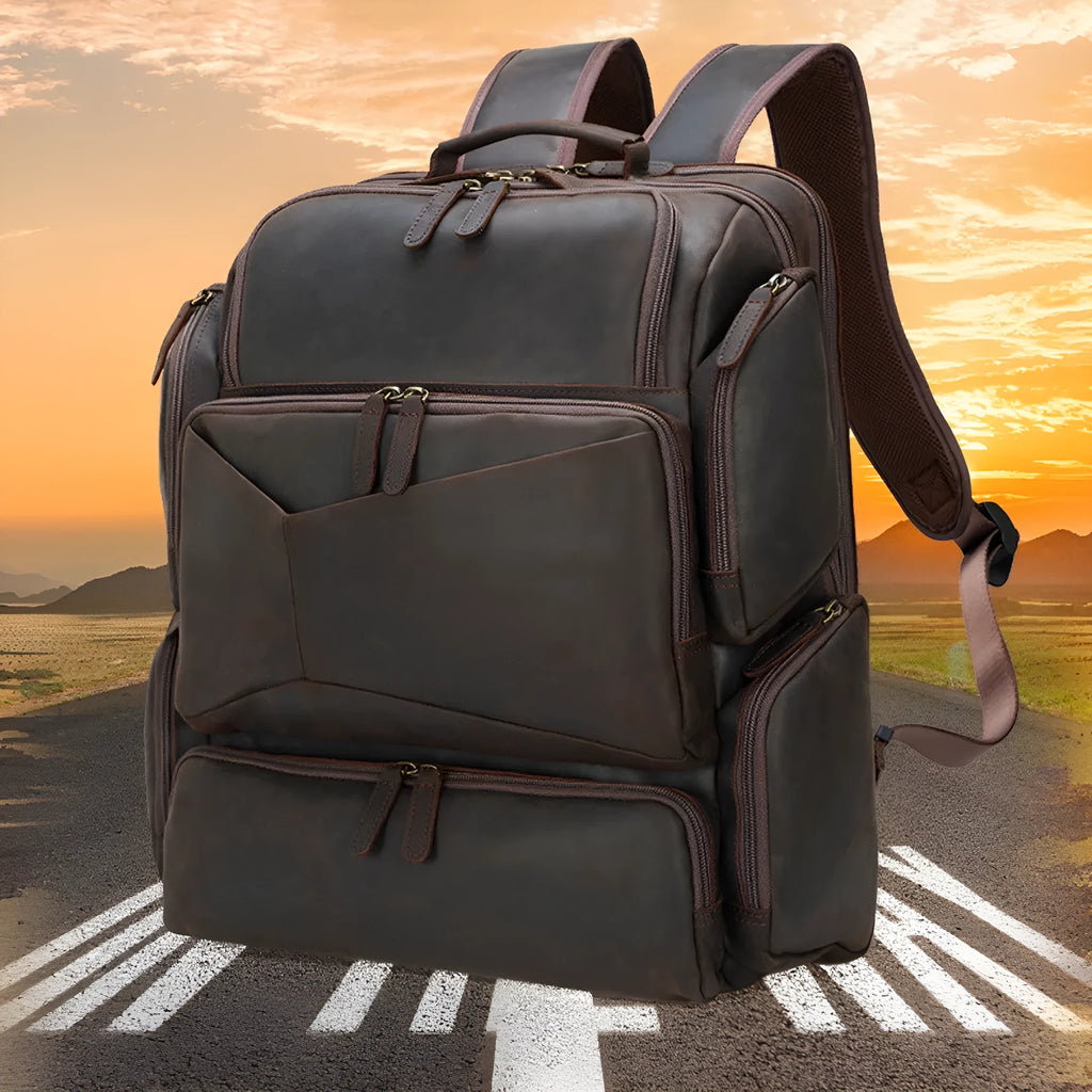 Dark brown leather backpack for men with 17-inch laptop compartment and multiple internal organisers