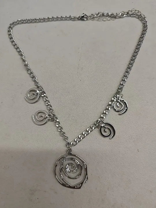 Spiral donut design jewellery set with necklace, bracelet and earrings in gold electroplated alloy