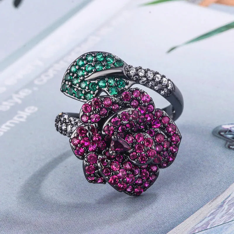 Gold-plated black gold geometric flower ring with simulation red corundum stones