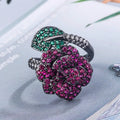 Gold-plated black gold geometric flower ring with simulation red corundum stones