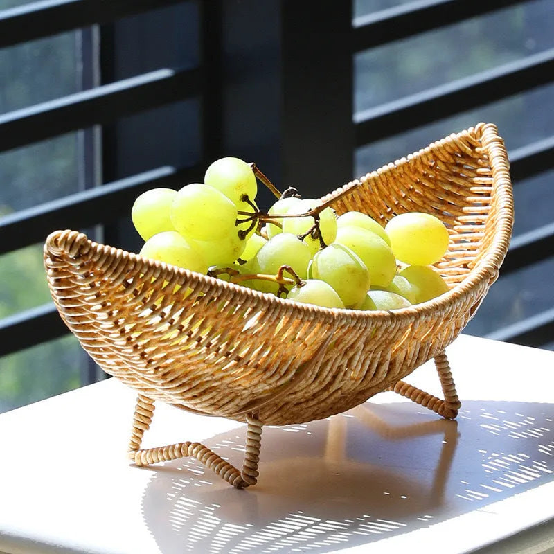 Plastic knitted basket fruit dim sum rack on a desktop with melon seeds and snacks