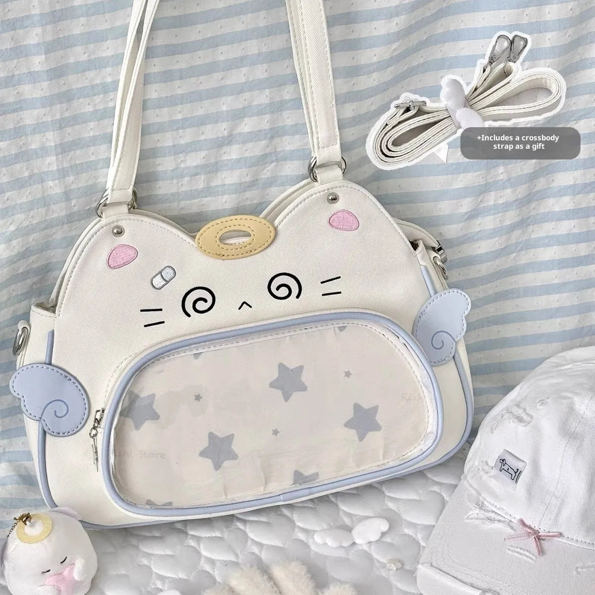 Horizontal cartoon owl pin PU crossbody bag in black, side view showing stitching and single strap