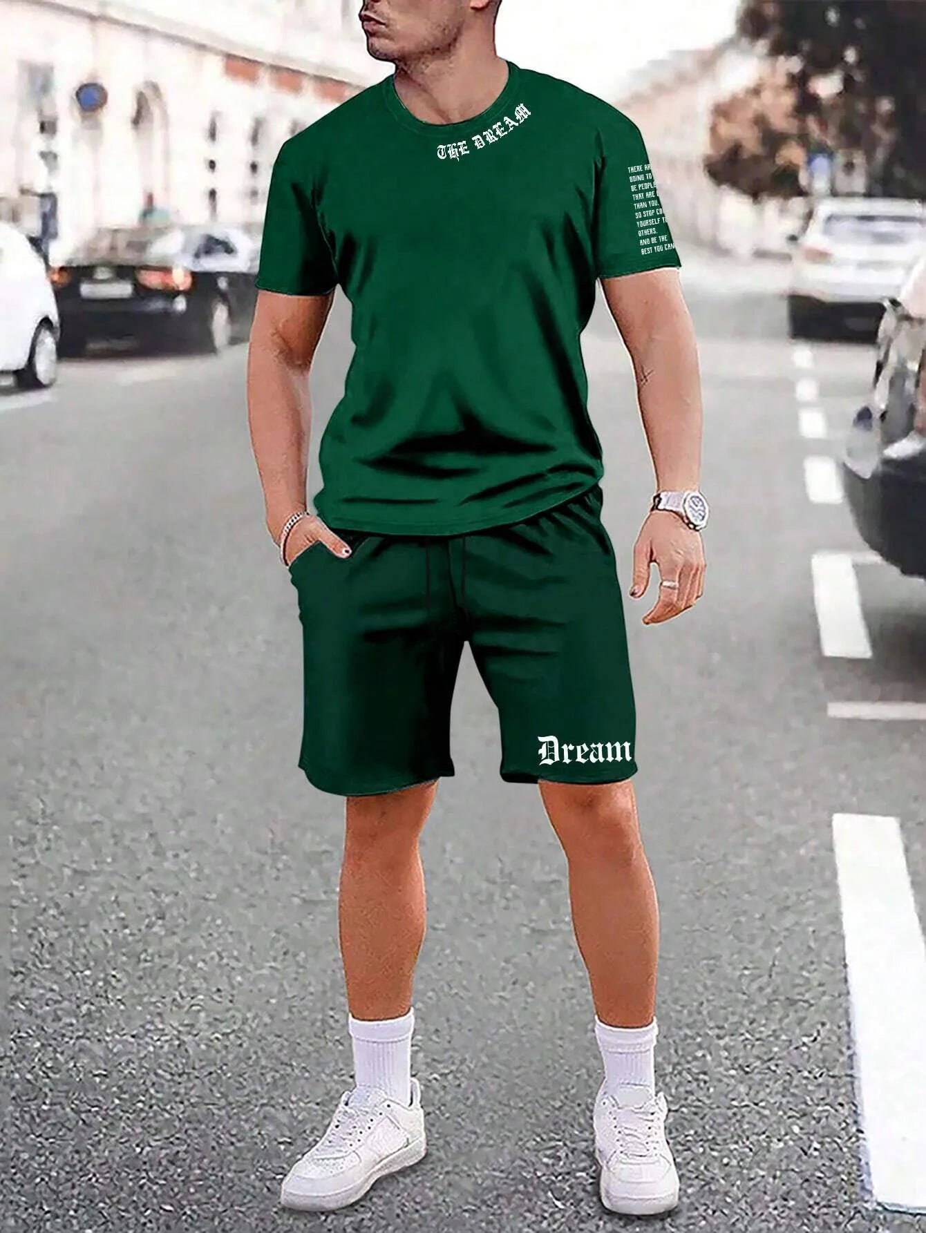 Men's blue short-sleeved sports top and matching shorts suit set on a hanger