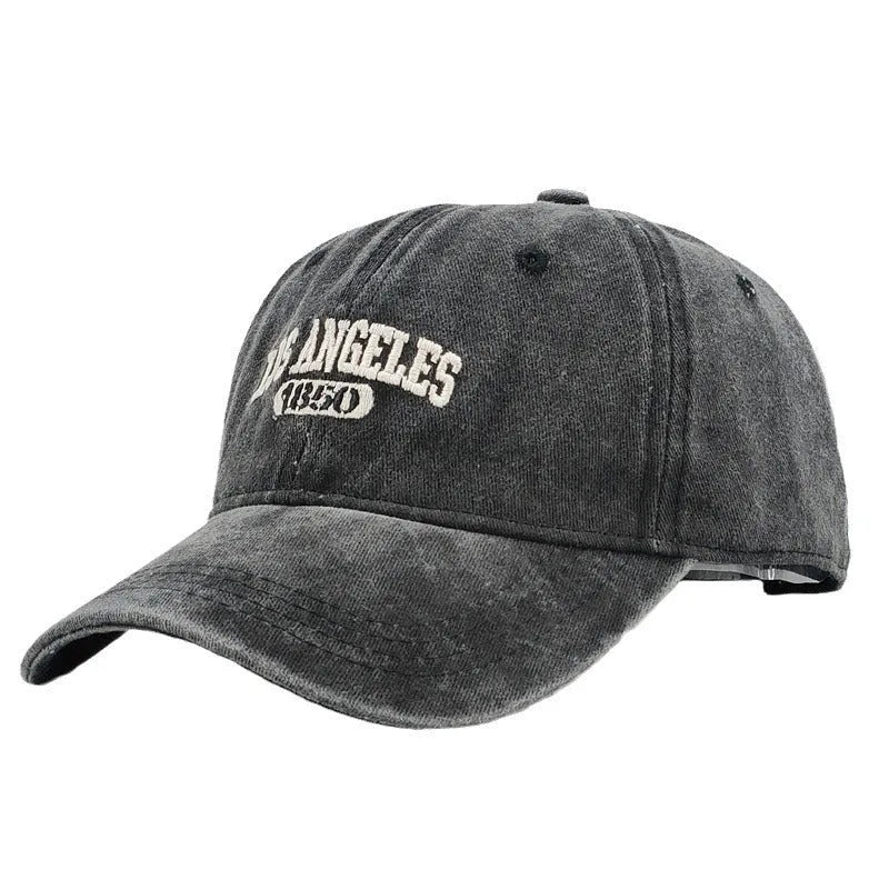 Retro personalised peaked cap with letters embroidery in beige, adjustable strap visible.