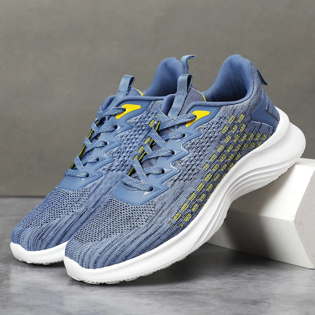 Women's lavender purple Flyknit running shoes with mesh lining and striped pattern.