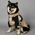 Khaki-coloured polyester dog shell coat shown on a model, sizes S to 5XL