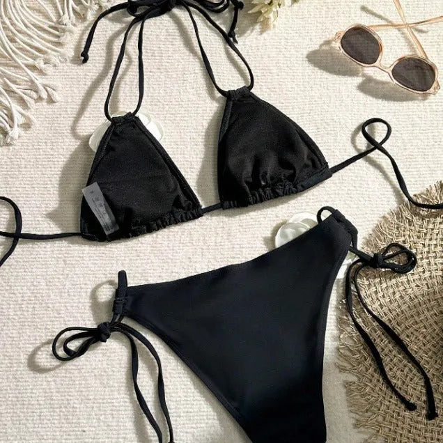 Black women's bikini swimsuit with 3D flower pattern and drawstring lace detailing on two-piece swimwear