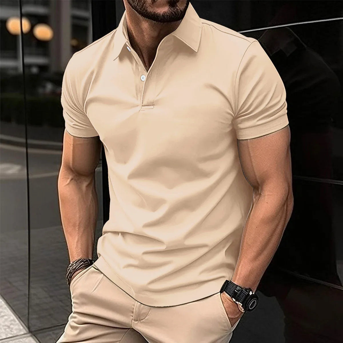 Men's short sleeve polo shirt with button lapel collar in a solid colour.