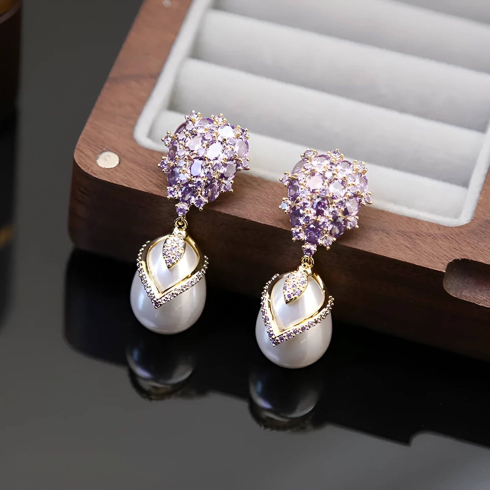 Women's drop-shaped earrings with pearl inlay and zircon stones on 18K copper