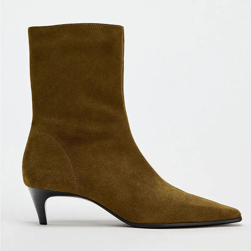 Brown square toe ankle boots with side zipper and kitten heels on a waterproof platform sole