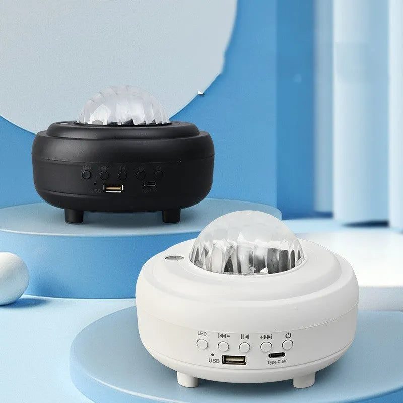 Galaxy star projector Bluetooth LED night light with starry sky projection in compact black rechargeable unit