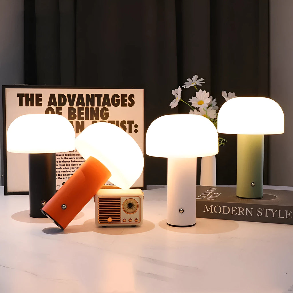 USB-powered dual-purpose table lamp in black, white, orange, or green colour on a desk.