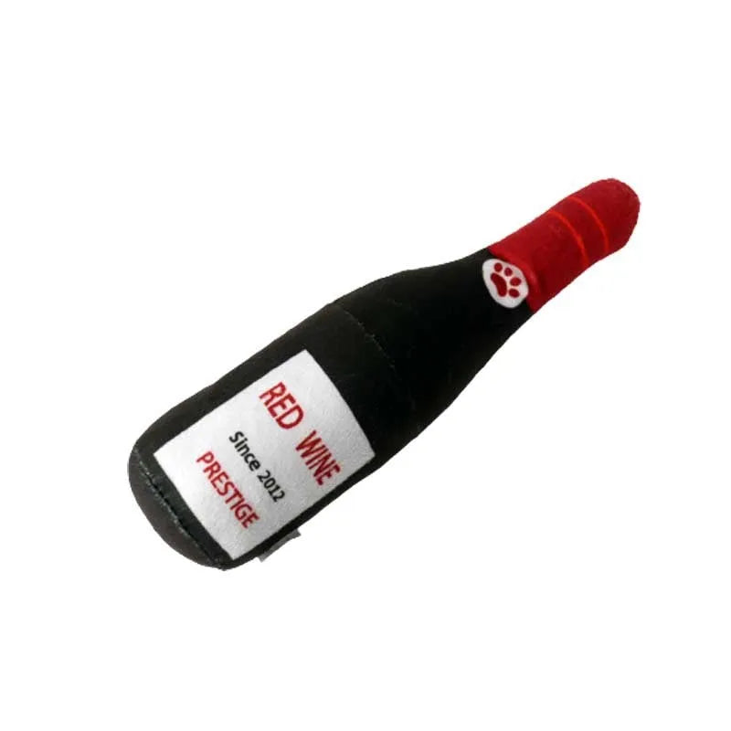 Green plush dog toy shaped like a wine bottle on a white background.