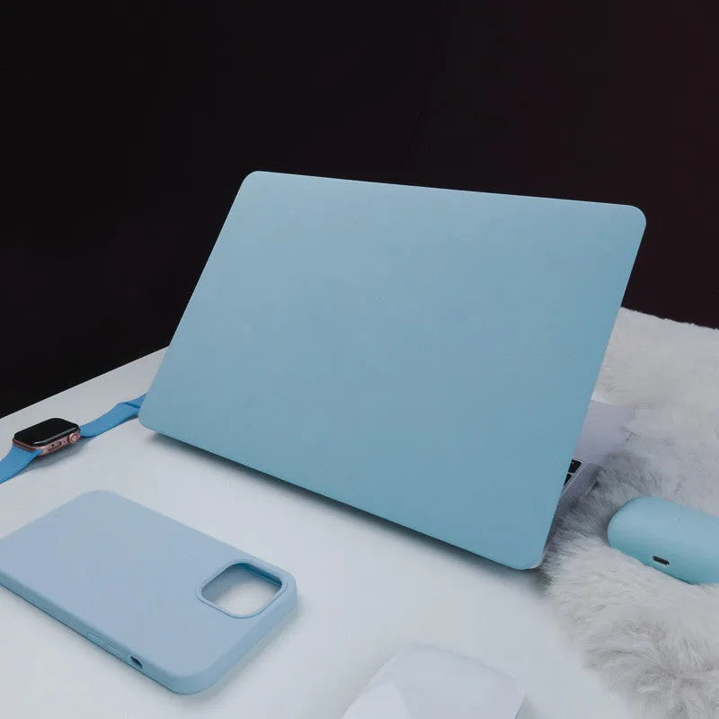 Dream Blue 16 inch laptop sleeve with colourful sticker-style print, open showing inner lining