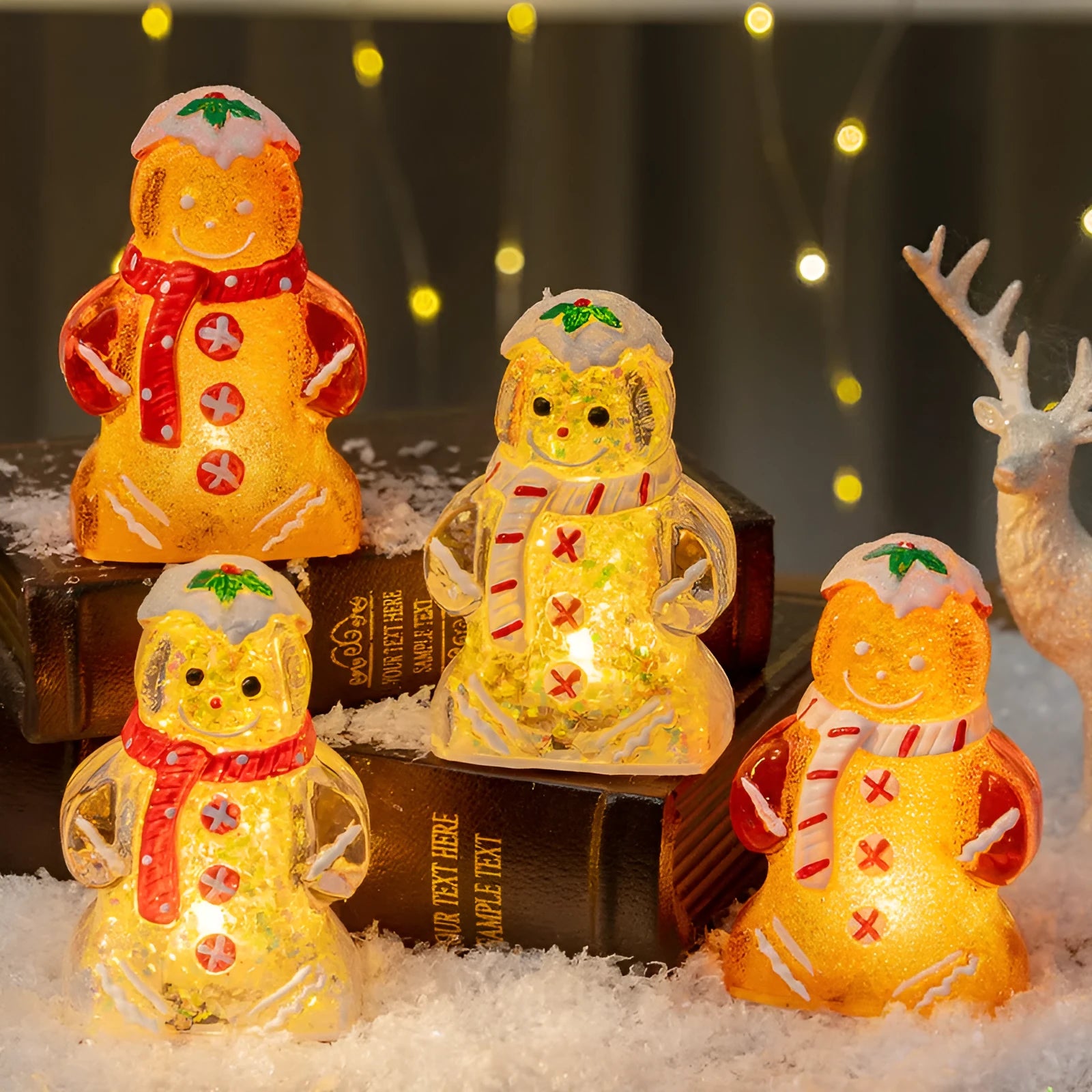 Glowing plastic gingerbread man snowman Christmas ornament with a choice of scarf colours on a festive background.
