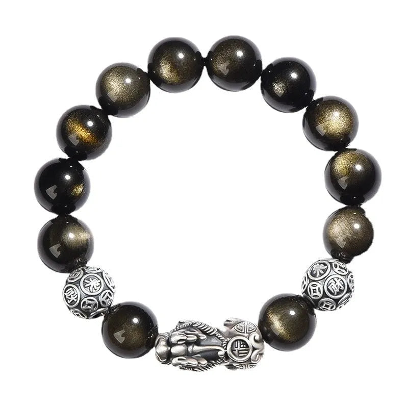 Men's geometric obsidian and sterling silver bracelet showing polished stones and metallic framework