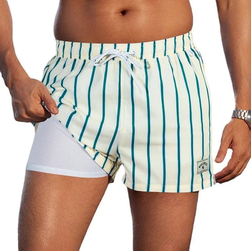Men's loose fit quick-drying boxer swimming trunks in a selection of floral and tropical print designs.