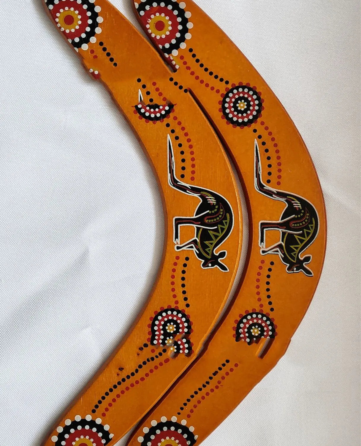 Wooden black V-shaped revolving dart with pull-back standard for outdoor juvenile sports play