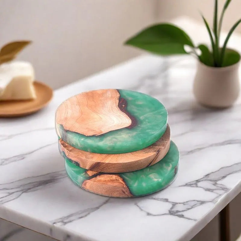 Wooden coaster with heat insulation resin in round tumour green colour on a table.