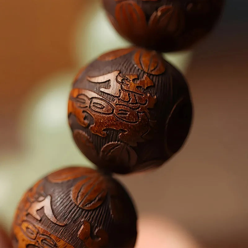 Wooden Fu character bracelet with twelve 20mm rosewood beads on flexible rings