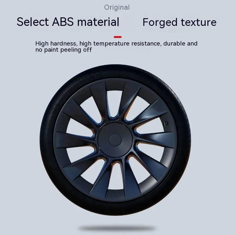 Tesla Model Y wheel hub cover with sectional steel ring design in black finish.